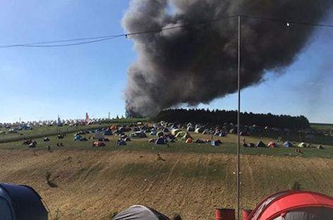 Boomtown Fair fire 'most likely' caused by discarded cigarette image