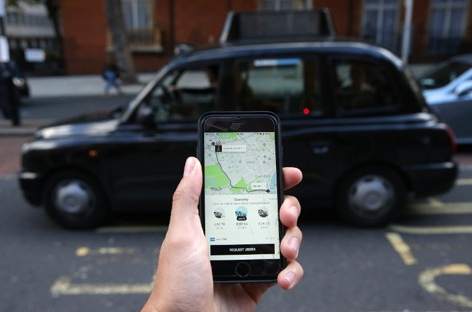 Uber wins appeal to keep license in London image